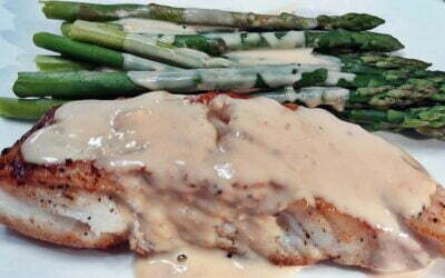 Halibut Citrus Topped with Homemade Alfredo Sauce & Steamed Asparagus on the Side