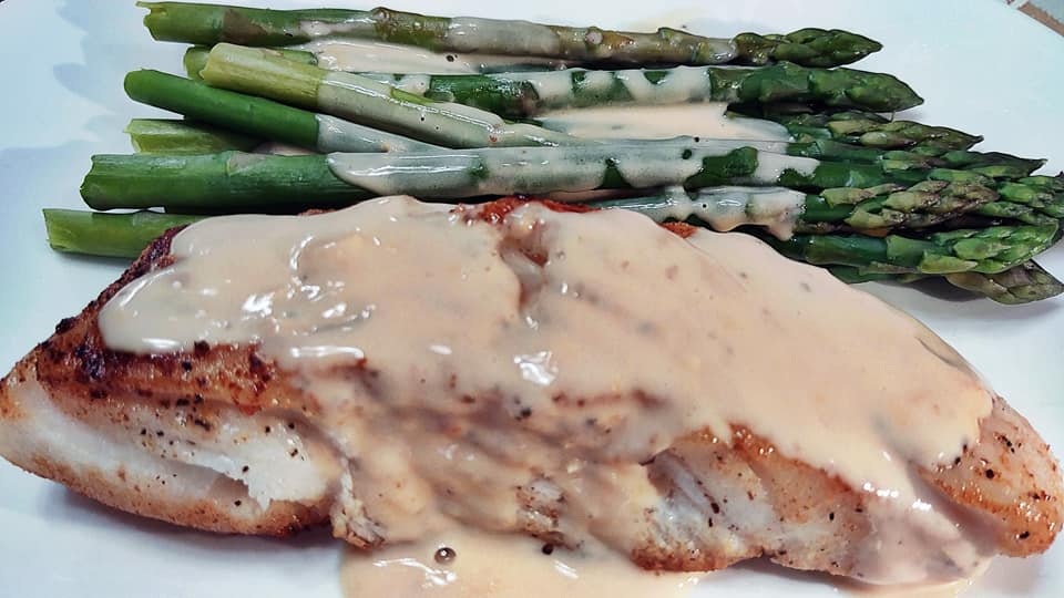 Halibut Citrus Topped with Homemade Alfredo Sauce & Steamed Asparagus on the Side